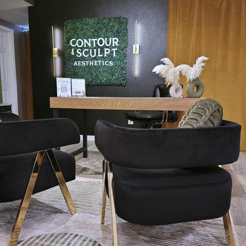 Reception and logo wall at Contour & Sculpt Aesthetics in Leander, TX