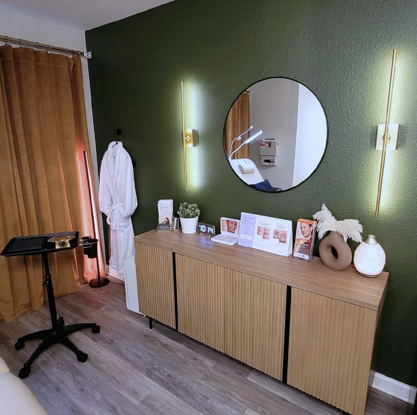 Studio interior with vanity mirror and robe at Contour & Sculpt Aesthetics in Leander, TX